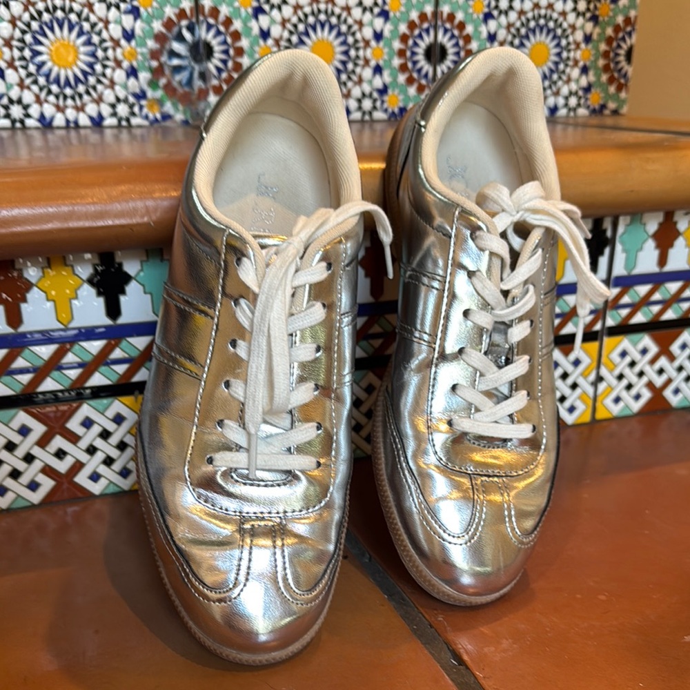 Slide into fall with  Metallic Sneakers 👟